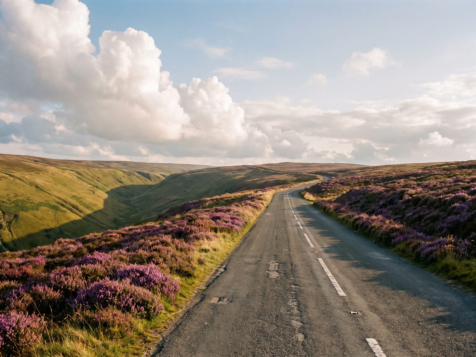 Near Pickering: a narrow tarmac road along a high exposed moorland ridge in the North York Moors